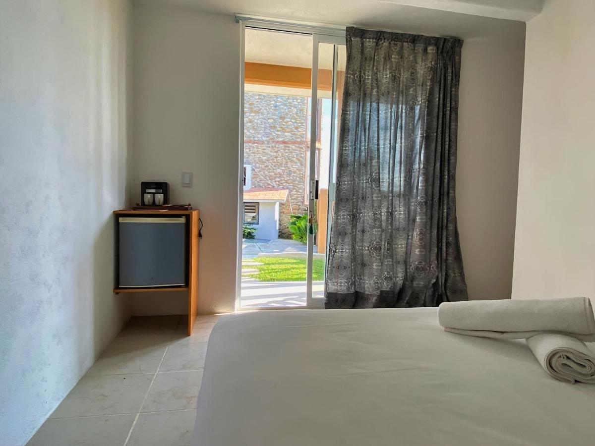 Casapiedra Aparthotel ปูแอร์โตเอสกอนดิโด ภายนอก รูปภาพ
